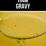A close-up of a spoonful of rich Ham Gravy held over a bowl, with the text "Holiday Ham Gravy" displayed at the top of the image.
