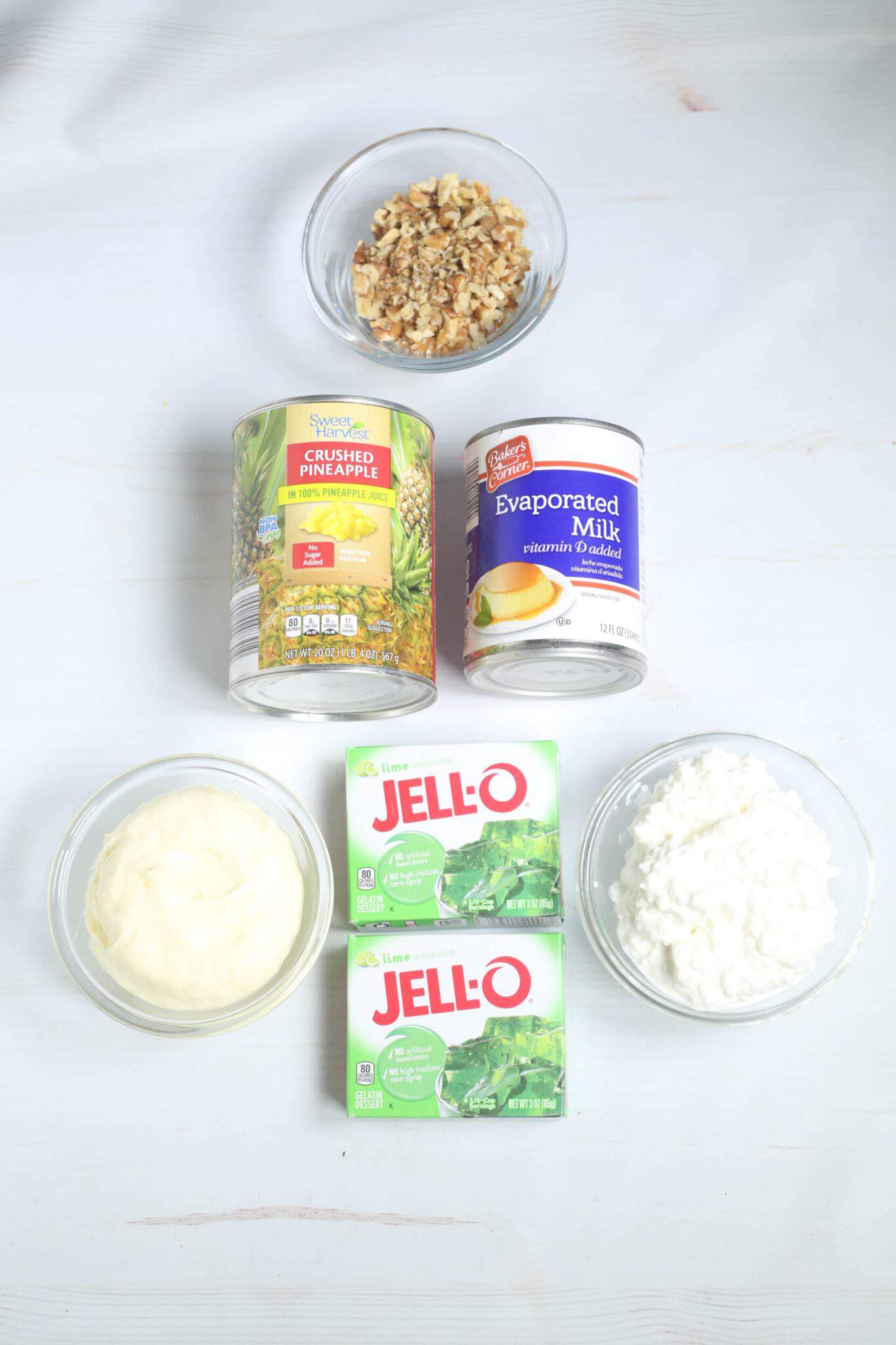 Cans of milk, boxes of jello and nuts.