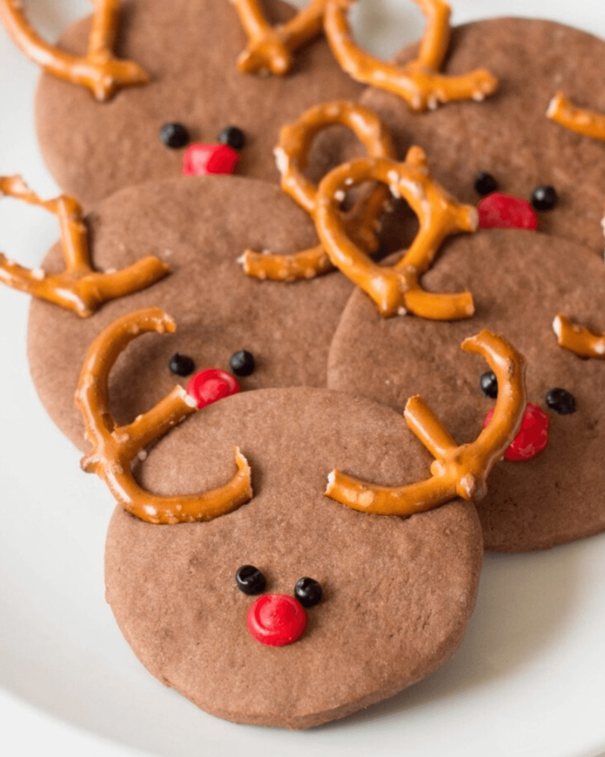 A platter of pretzel reindeer cookies.