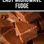 Close-up of several squares of Easy Microwave Fudge stacked on a wooden surface, with text above reading "2 Ingredient Easy Microwave Fudge.