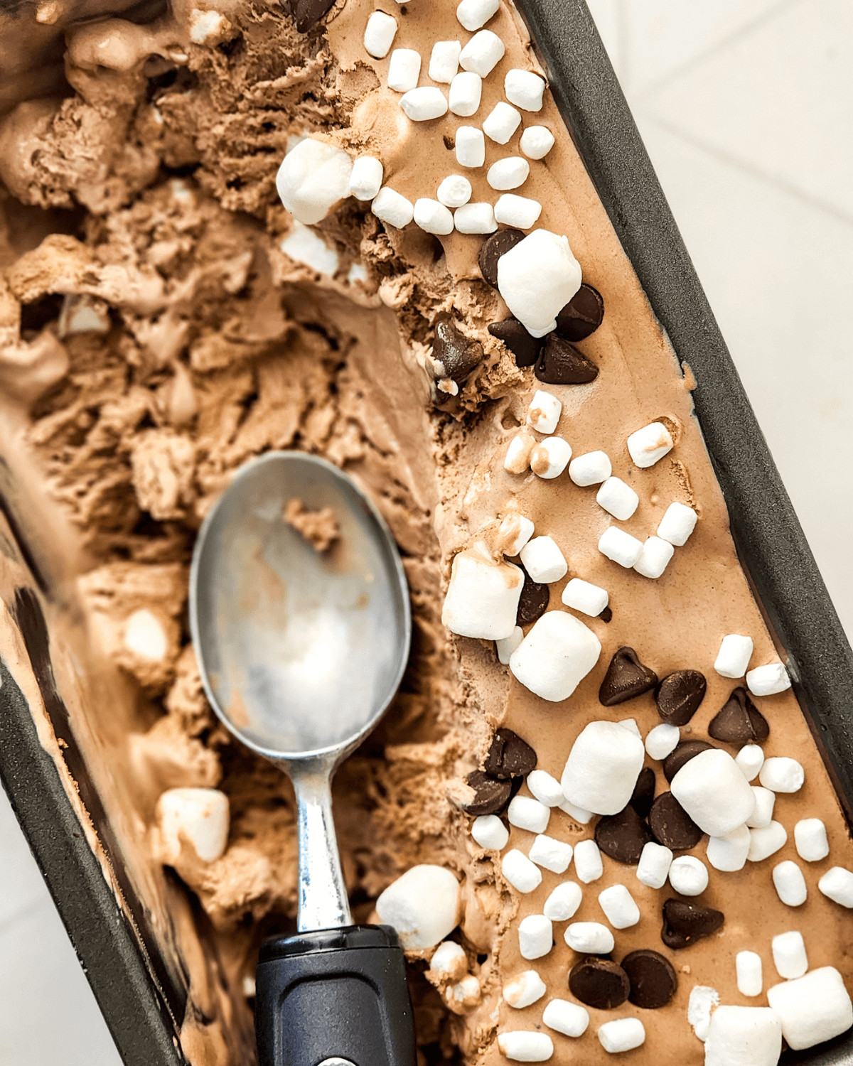 Creamy cocoa condensed milk ice cream with sweet marshmallows, made with condensed milk.