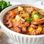 Cowboy stew featuring tender meat and hearty vegetables.