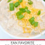 Cream cheese taco dip (boat dip) served with tortilla chips in a bowl.