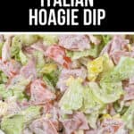 Close-up of a creamy hoagie dip with lettuce, meats, and cheese chunks in a white bowl, complete with a label "Make Ahead Italian Hoagie Dip.