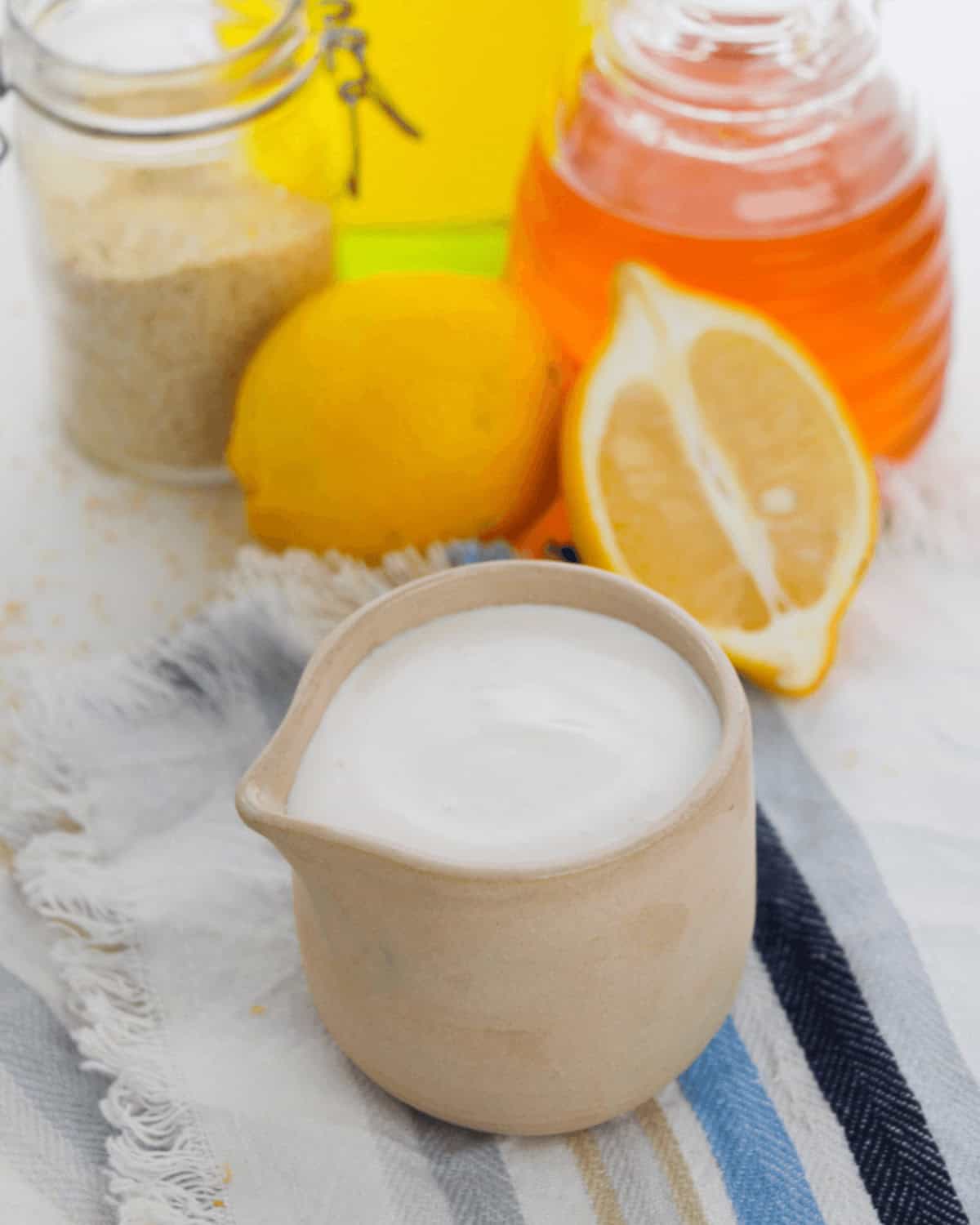 The sauce with lemon pieces beside it.
