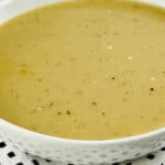 A bowl of homemade pork gravy.