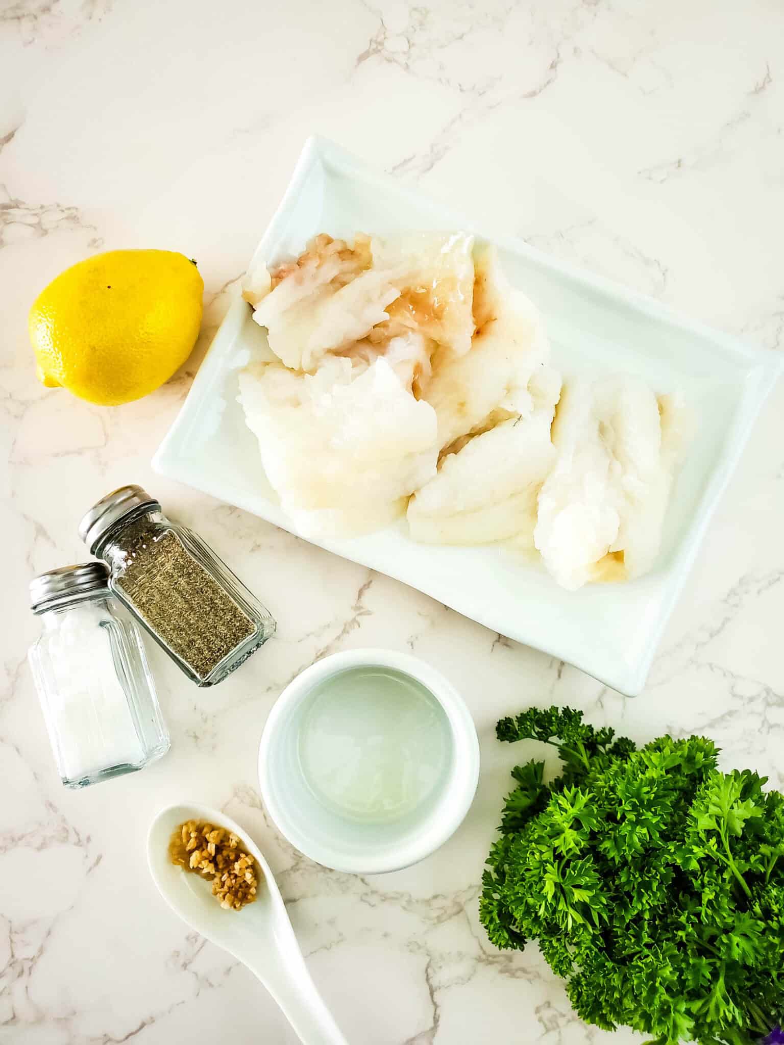 Herbs, lemon and fish.