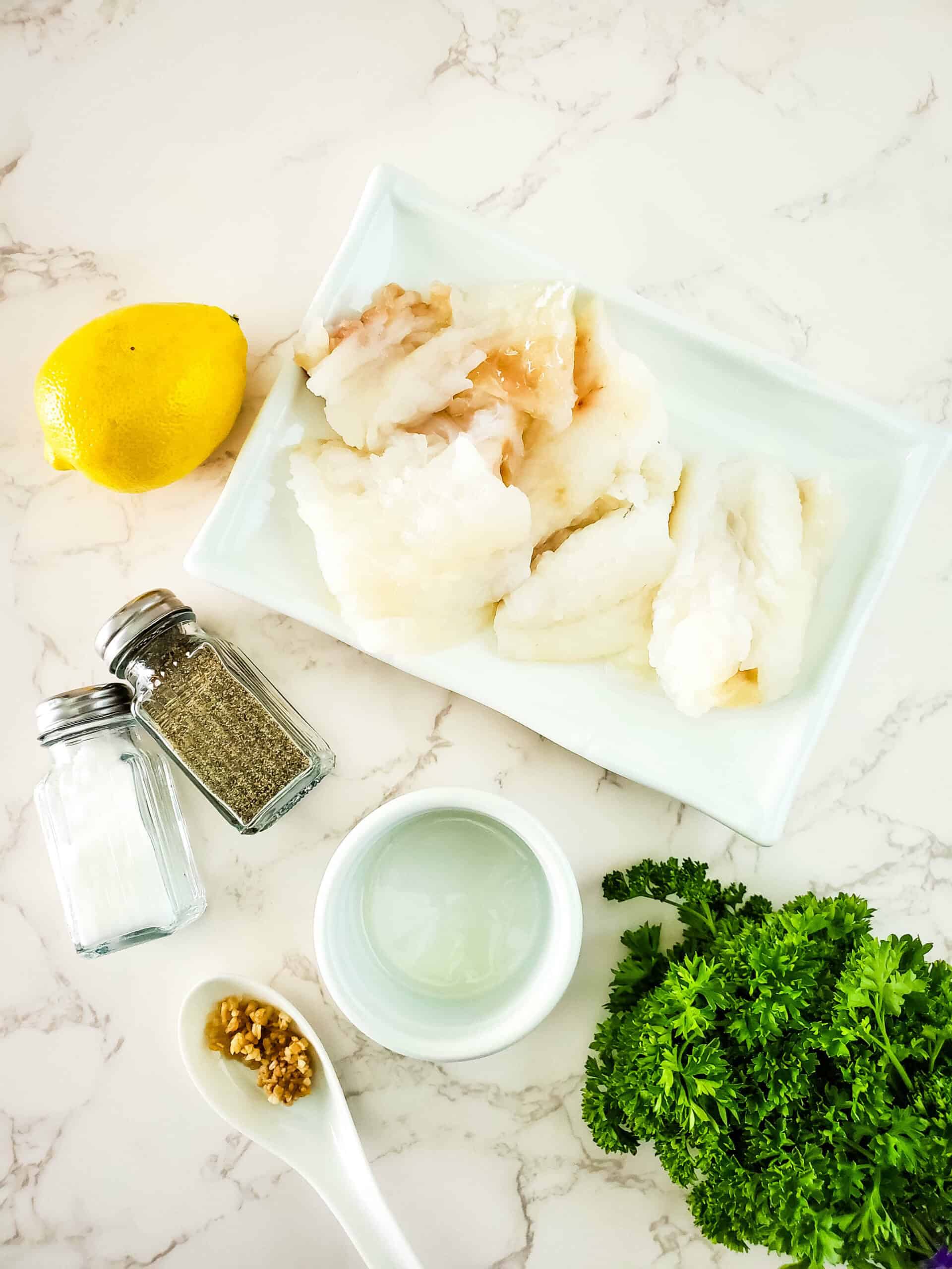Herbs, lemon and fish.