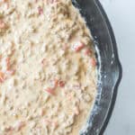 Creamy Velveeta rotel dip in a pan.