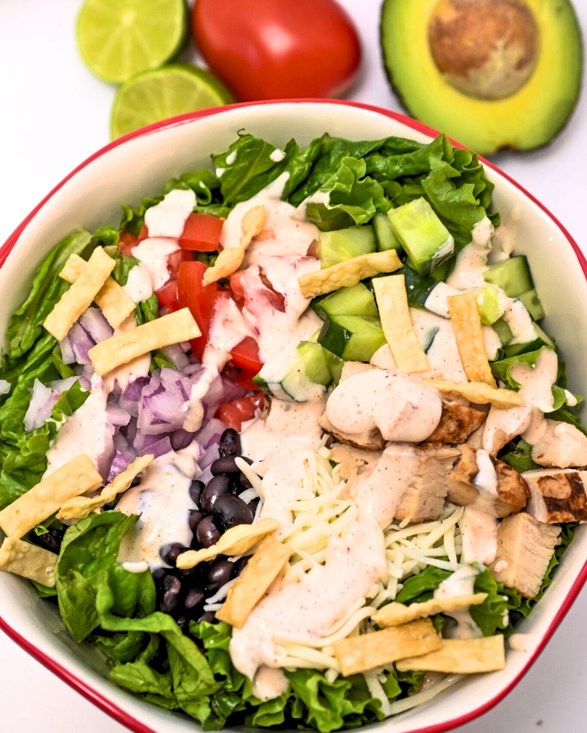 A white bowl filled with spicy southwest salad.
