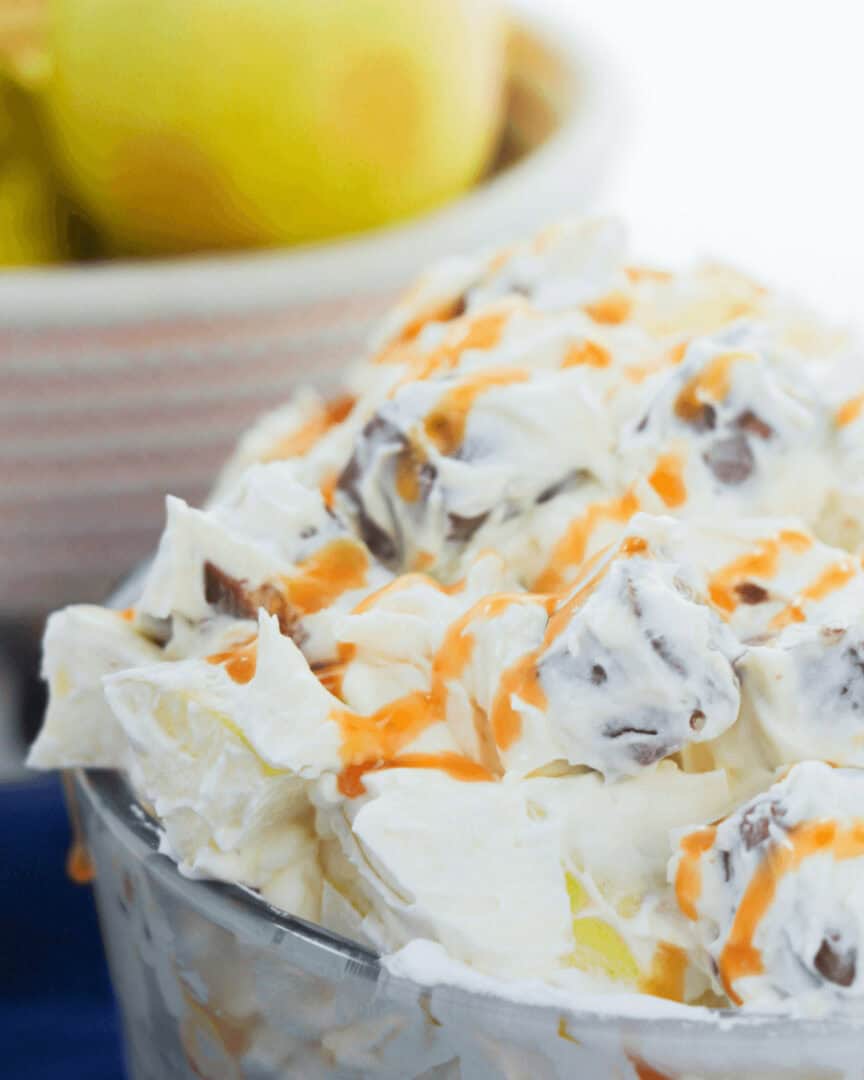 A bowl of apple snickers salad.