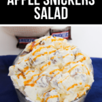 Apple Snickers Salad served on a vibrant blue plate.