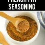 A bowl of french fry seasoning, wooden spoon.