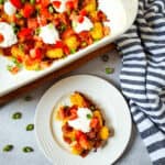 A casserole dish of the loaded tater tots.