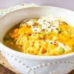 A bowl of ramen mac and cheese in a white bowl.