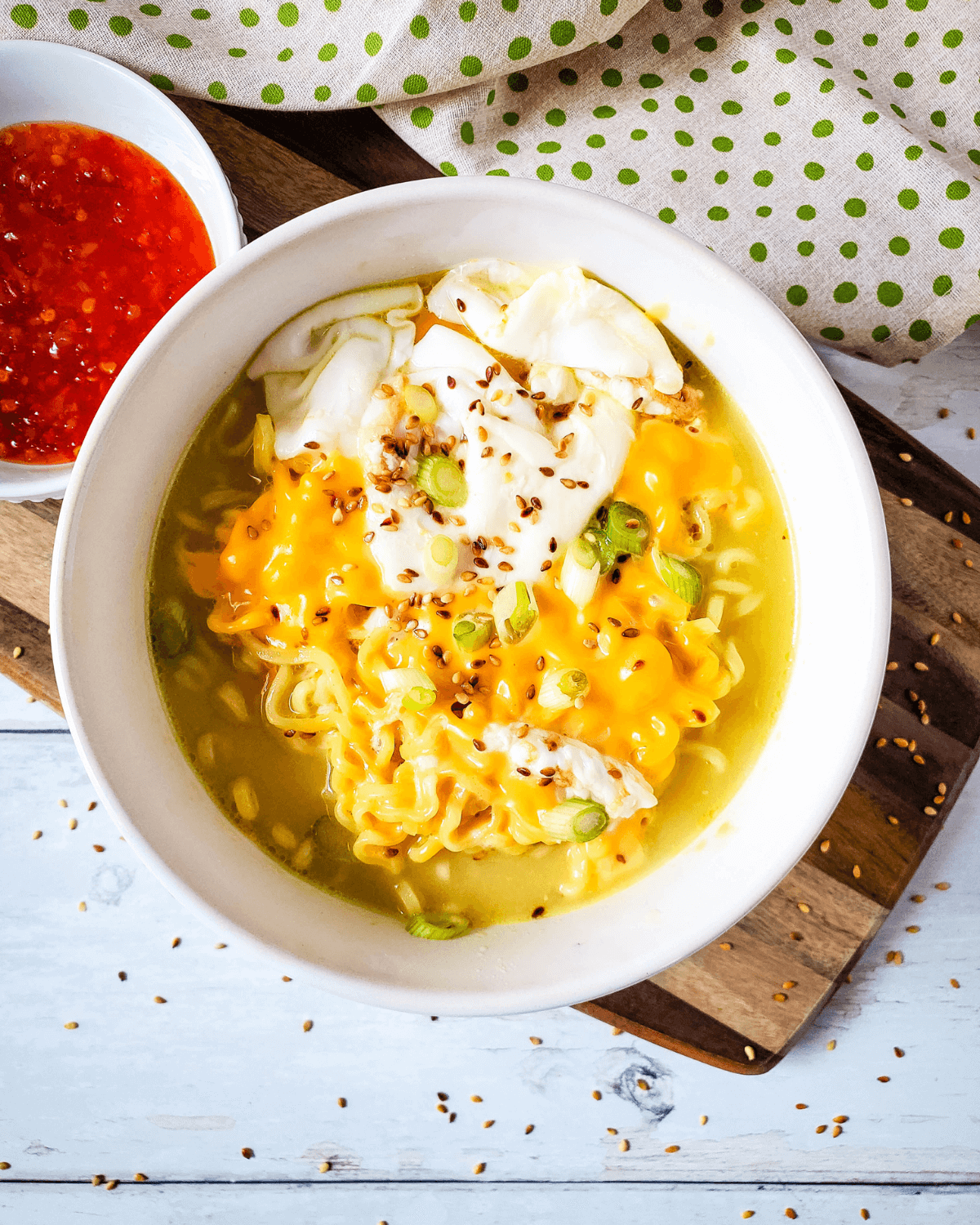 A bowl of the dinner with egg on top.