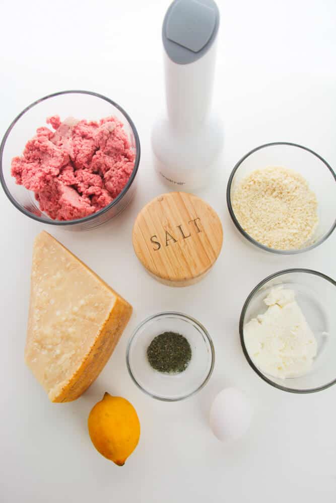 The ingredients for the meal. Cheese, ground meat and seasoning.