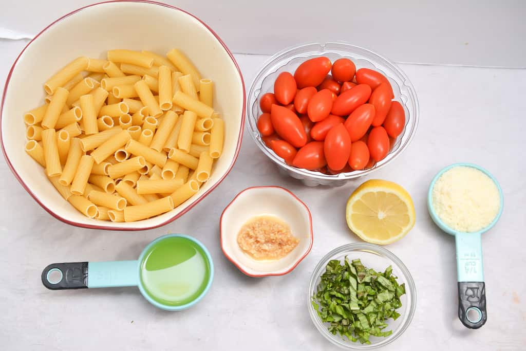 Cherry tomatoes, fresh herbs, ziti and herbs.