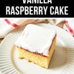 A vanilla raspberry cake served on a white plate.