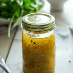 A jar of white balsamic vinaigrette.