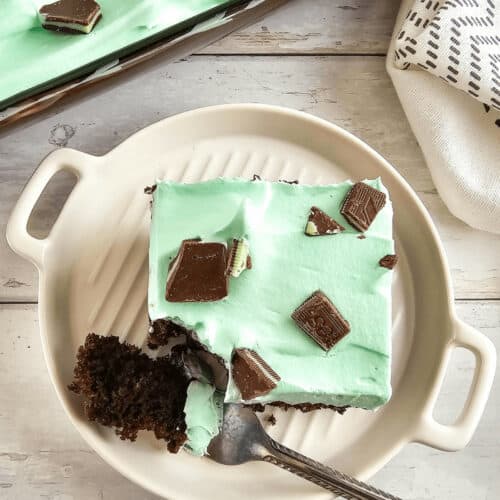 A piece of dessert on a white plate.