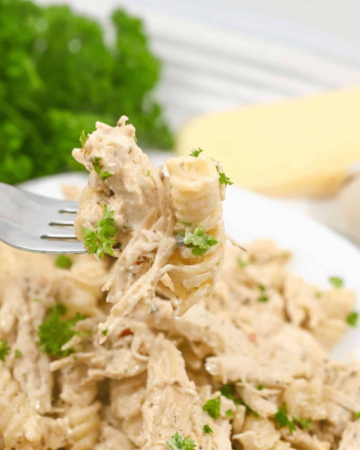 A fork full of the delicious dinner.