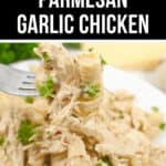 Crock pot garlic parmesan chicken served on a fork, garnished with parsley.