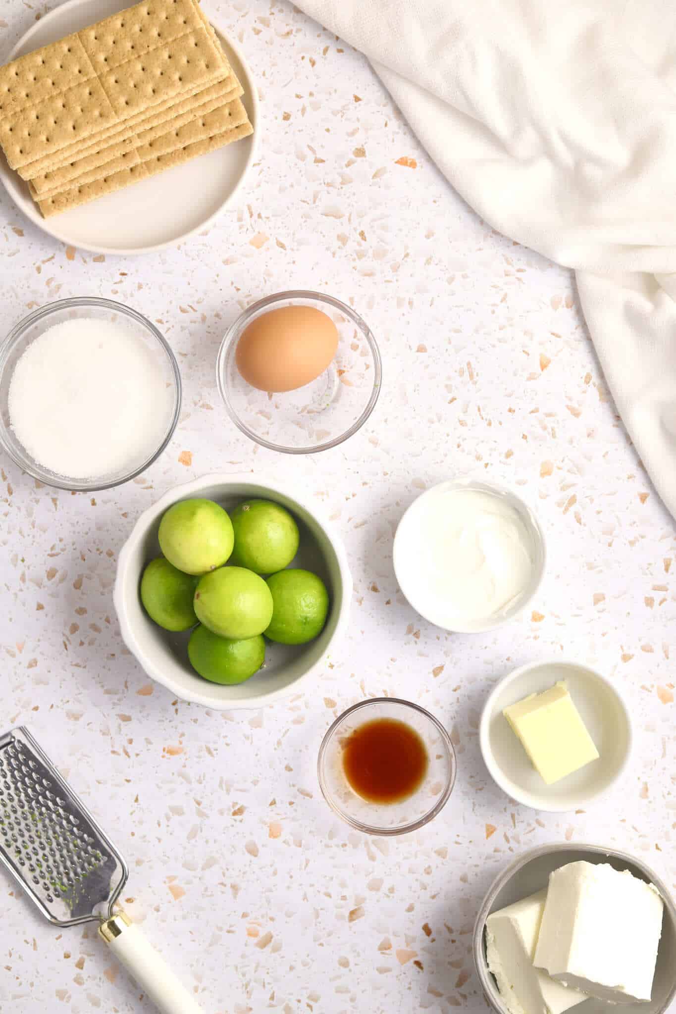 Flour, sugar, graham crackers and the fruit for the dessert.