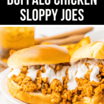 Slow cooker buffalo chicken sloppy joes served on buns with a drizzle of dressing.