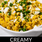 A white bowl filled with creamy Elote Salad, topped with chopped cilantro and crumbled cheese. Text below reads: "Creamy Elote Salad Mexican Street Corn Salad.