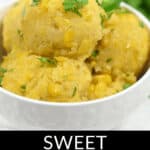 Three scoops of sweet Mexican corn cake garnished with parsley in a white bowl, with green leaves in the background.