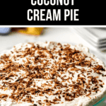 Old Fashioned Coconut Cream Pie topped with whipped cream and toasted coconut flakes, presented on a light blue plate with a white background.