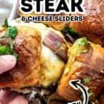 Hand holding a Philly steak and cheese slider with melted cheese, beef, and herbs on top; other steak and cheese sliders are in a baking dish. Text reads “Philly steak & cheese sliders. Savory.”.