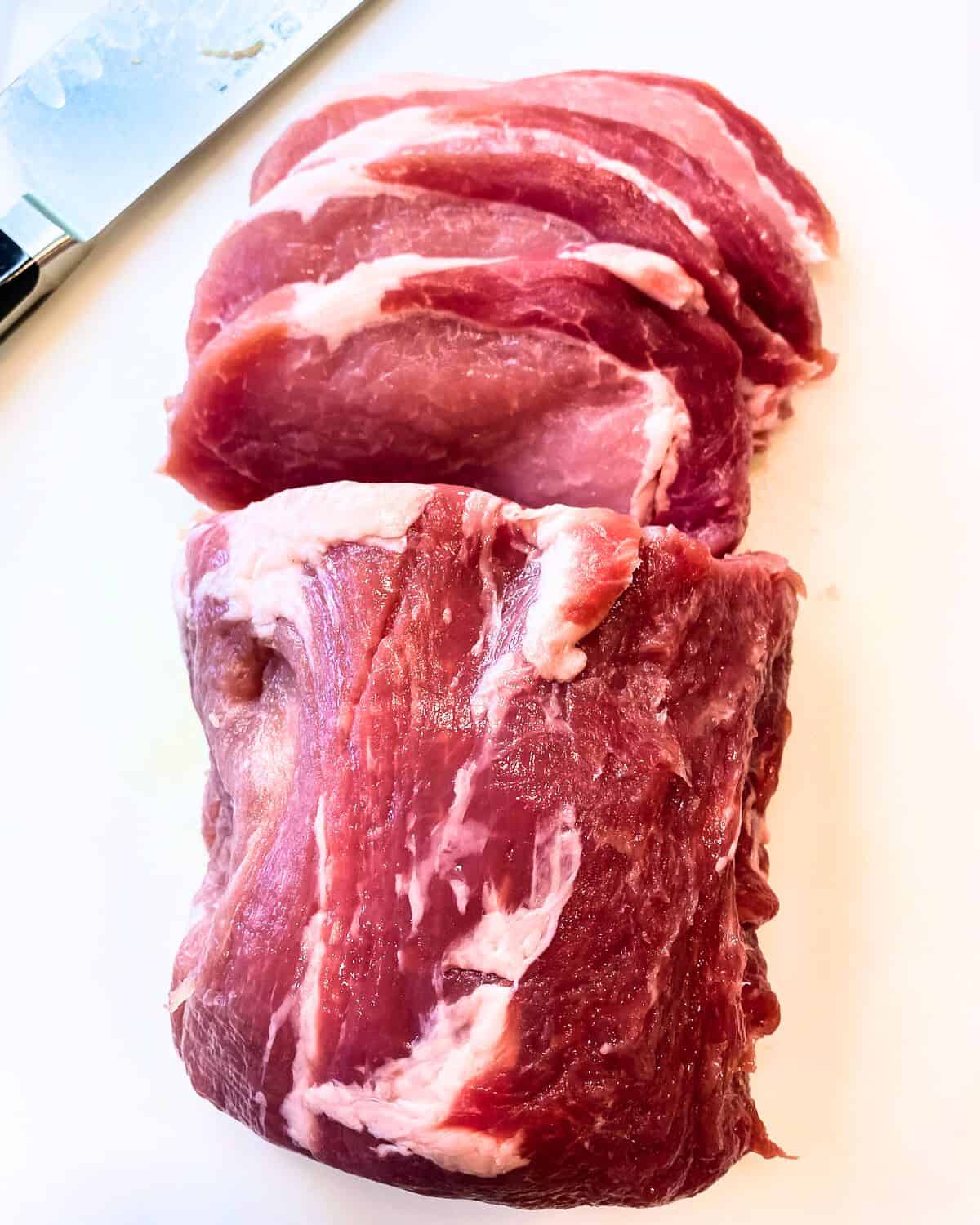 Pork loin sliced into cutlets.