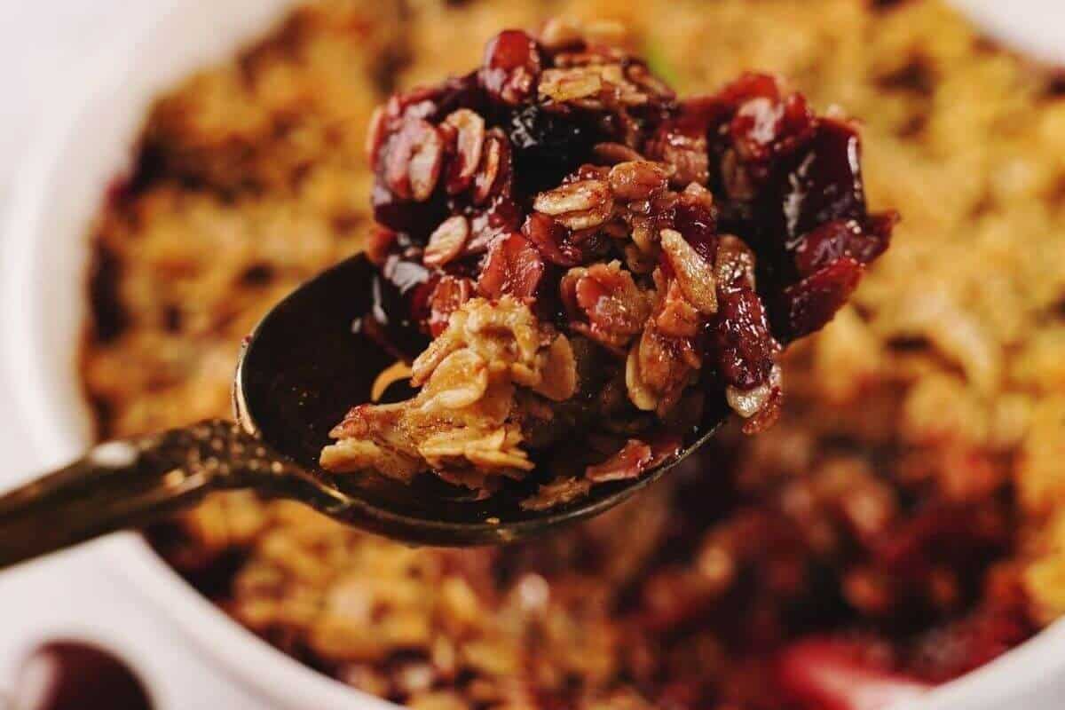 A spoonful of blueberry apple crumble.