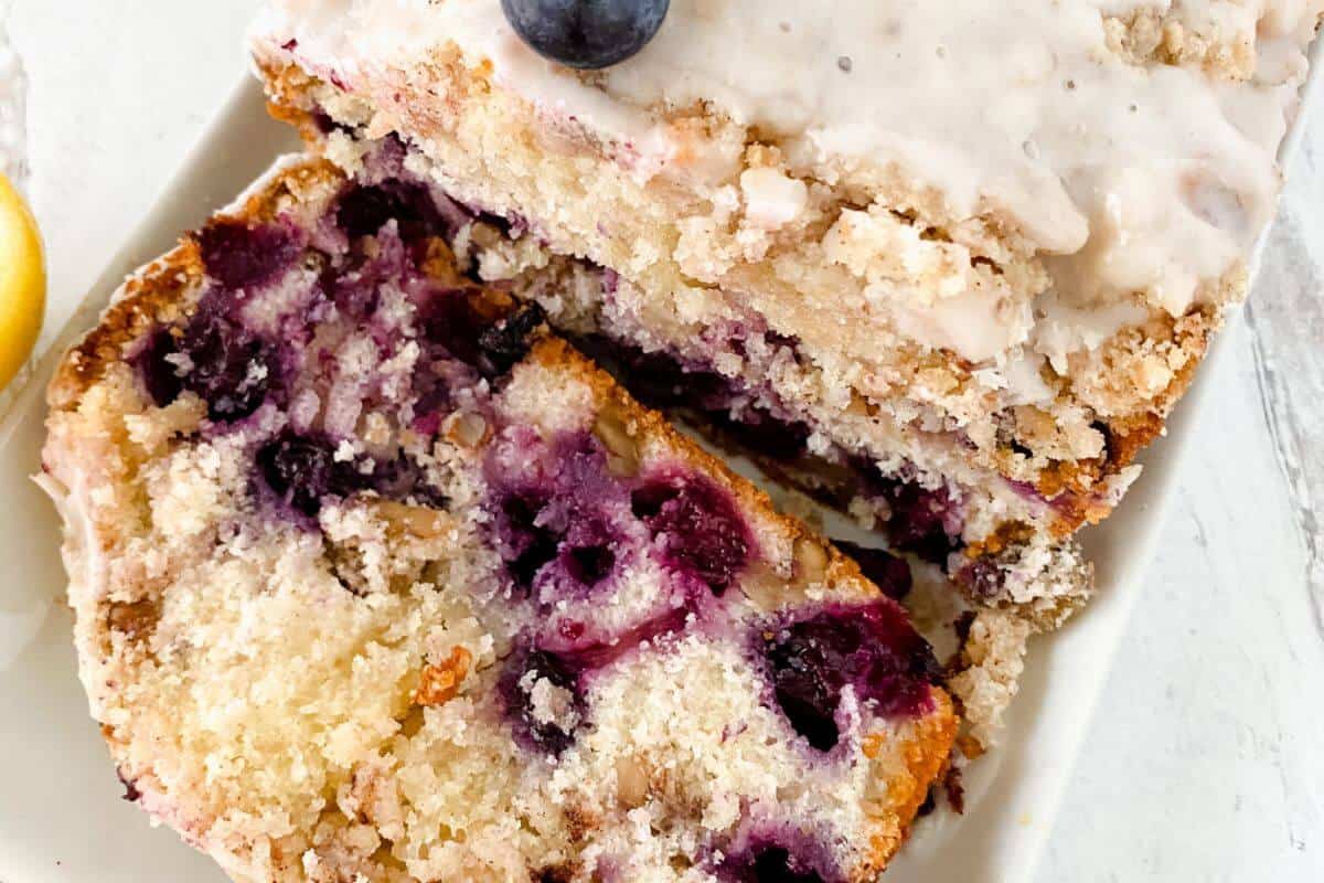 Blueberry lemon loaf on a white plate. 