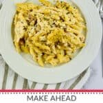 A plate of chicken cordon bleu casserole featuring penne pasta, shredded chicken, and diced ham, garnished with herbs. The text below reads, "Make Ahead Chicken Cordon Bleu Casserole.