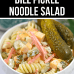A bowl of dill pickle noodle salad topped with slices of pickles and vegetables, labeled as "Dill Pickle Noodle Salad.