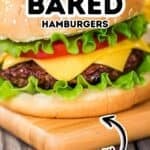 Close-up of a hamburger with lettuce, tomato, cheese, and beef patty in a sesame seed bun on a wooden board. Text reads “Best Baked Hamburgers” and “Juicy” with an arrow pointing to the burger.