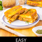 A plate with hearty buffalo chicken grilled cheese sandwiches, garnished with herbs. A drink and another sandwich are in the background. Text at the bottom reads: "Easy Buffalo Chicken Grilled Cheese.