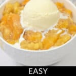 A bowl of peach cobbler with cake mix topped with a scoop of vanilla ice cream. Text overlay reads, "Easy Peach Cobbler with Cake Mix.