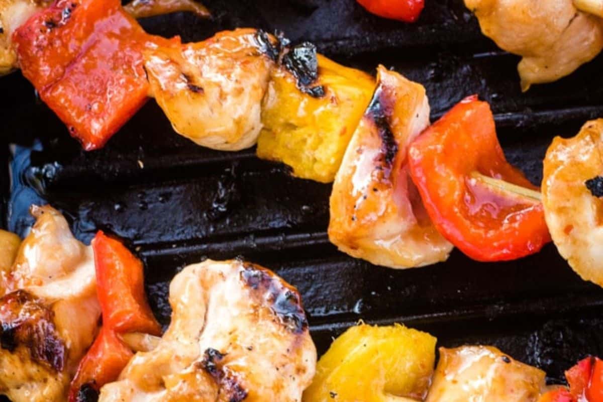 Maple chicken kabobs on grill. 