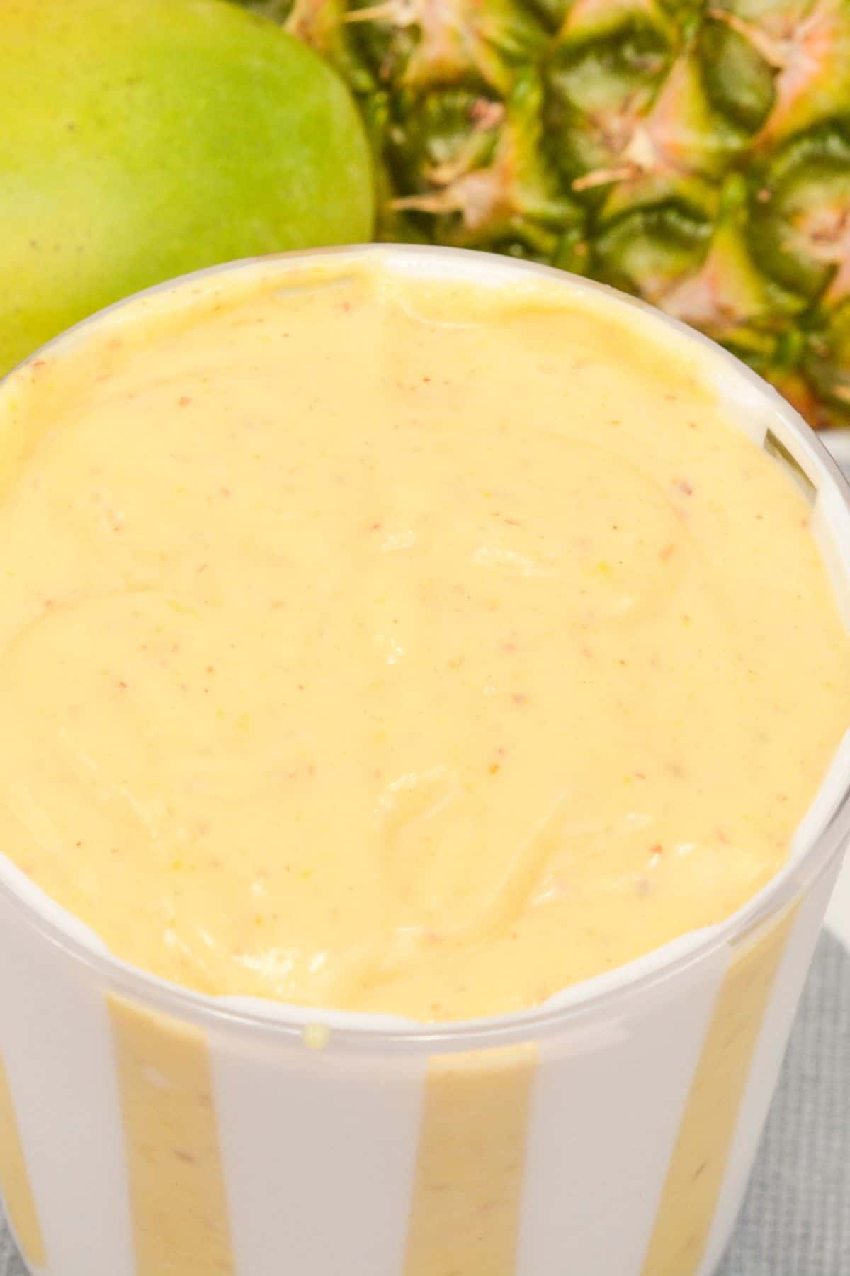 A close up on the mango pineapple smoothie.