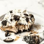 A white plate with the dessert on top.