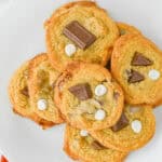 A white plate with an array of the dessert on them.