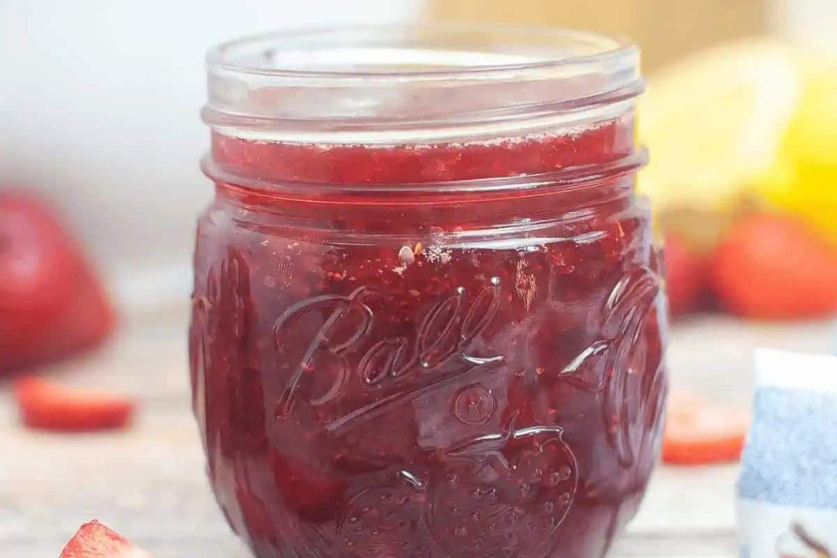 Close-up of a jar of strawberry jam.