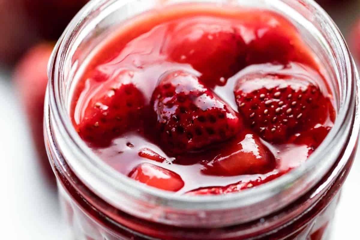 Close-up of a jar of homemade strawberry jam.
