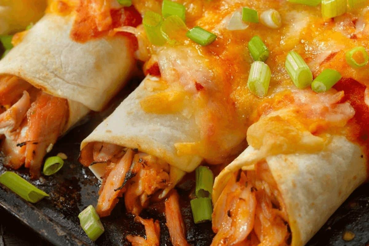 3 cheesy chicken enchiladas. 