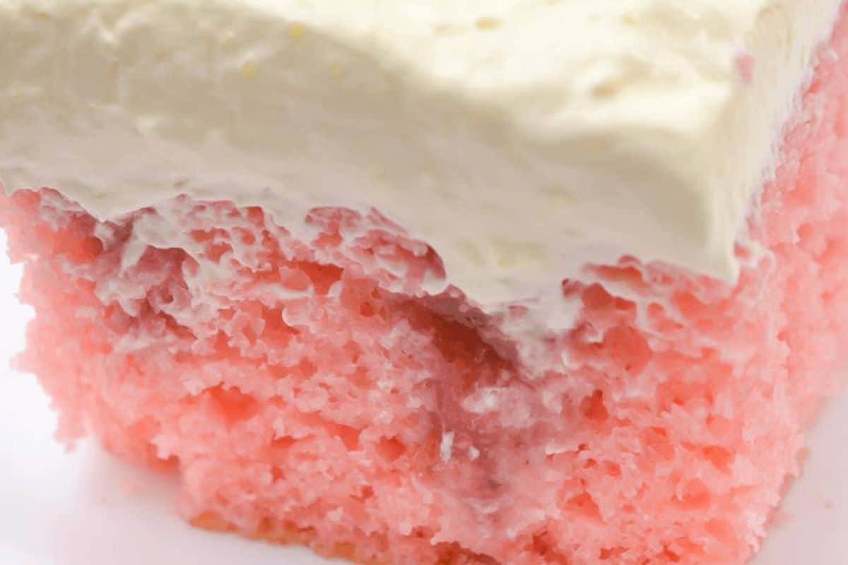 Close-up, pink strawberry poke cake. 