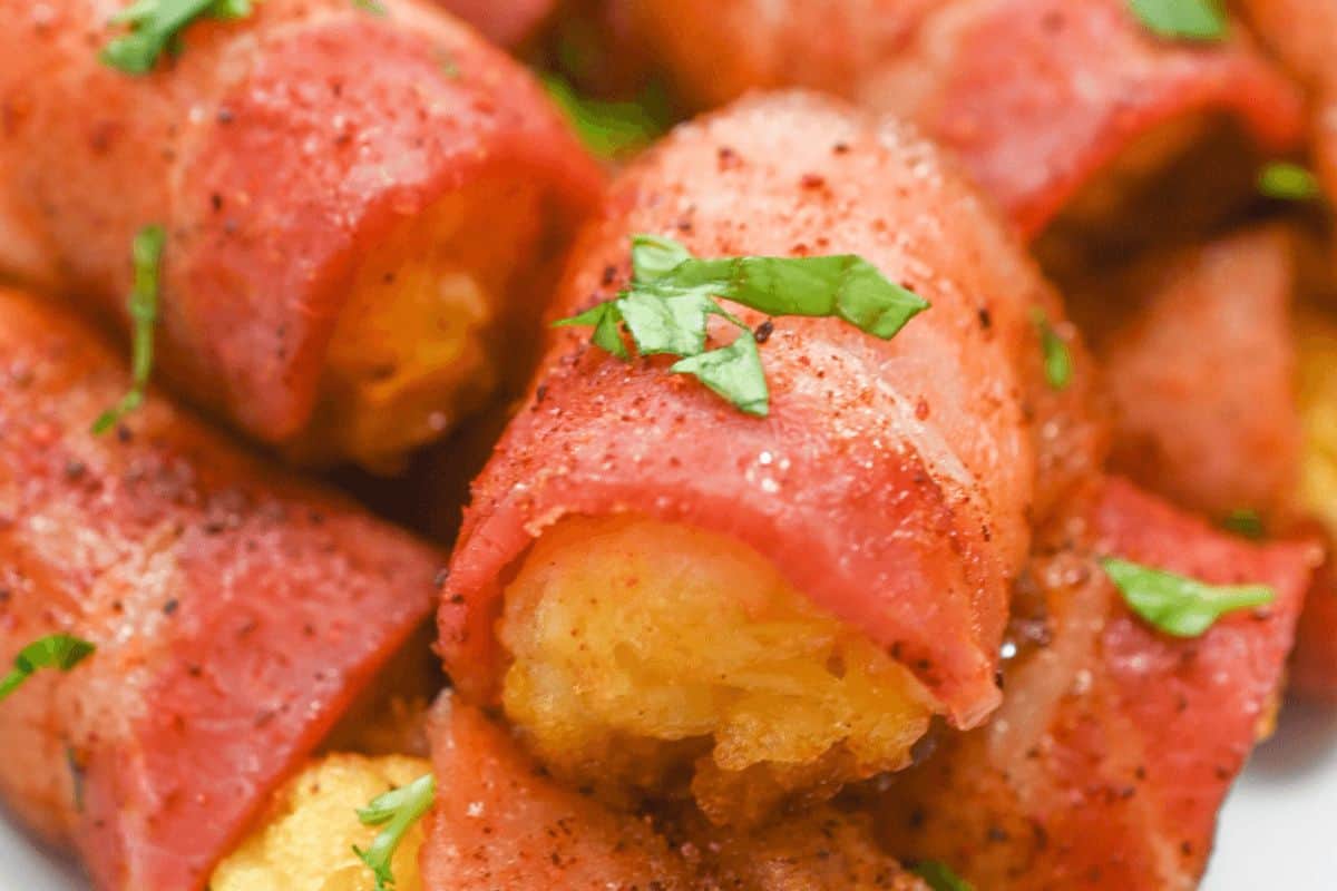 Bacon wrapped tater tots stacked. 